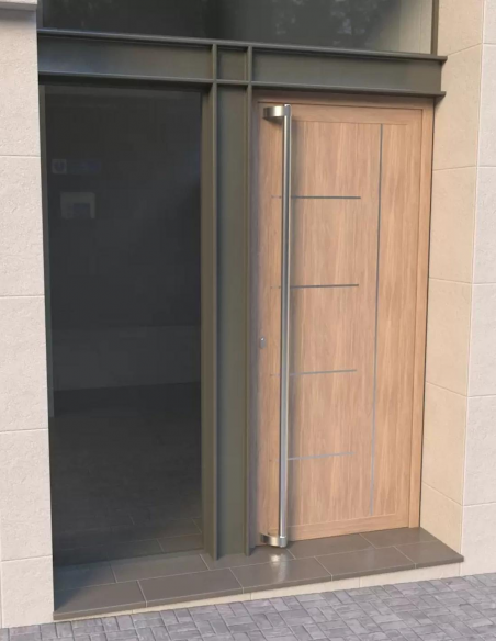 Vista del Tubo Tirador Apolo Inox Pulido Instalado en una Puerta de madera