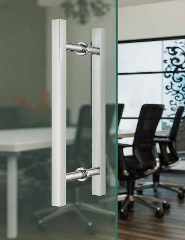 Vista del Juego Tirador Cenot 450x300 Inox Instalado en Una Puerta de vidrio